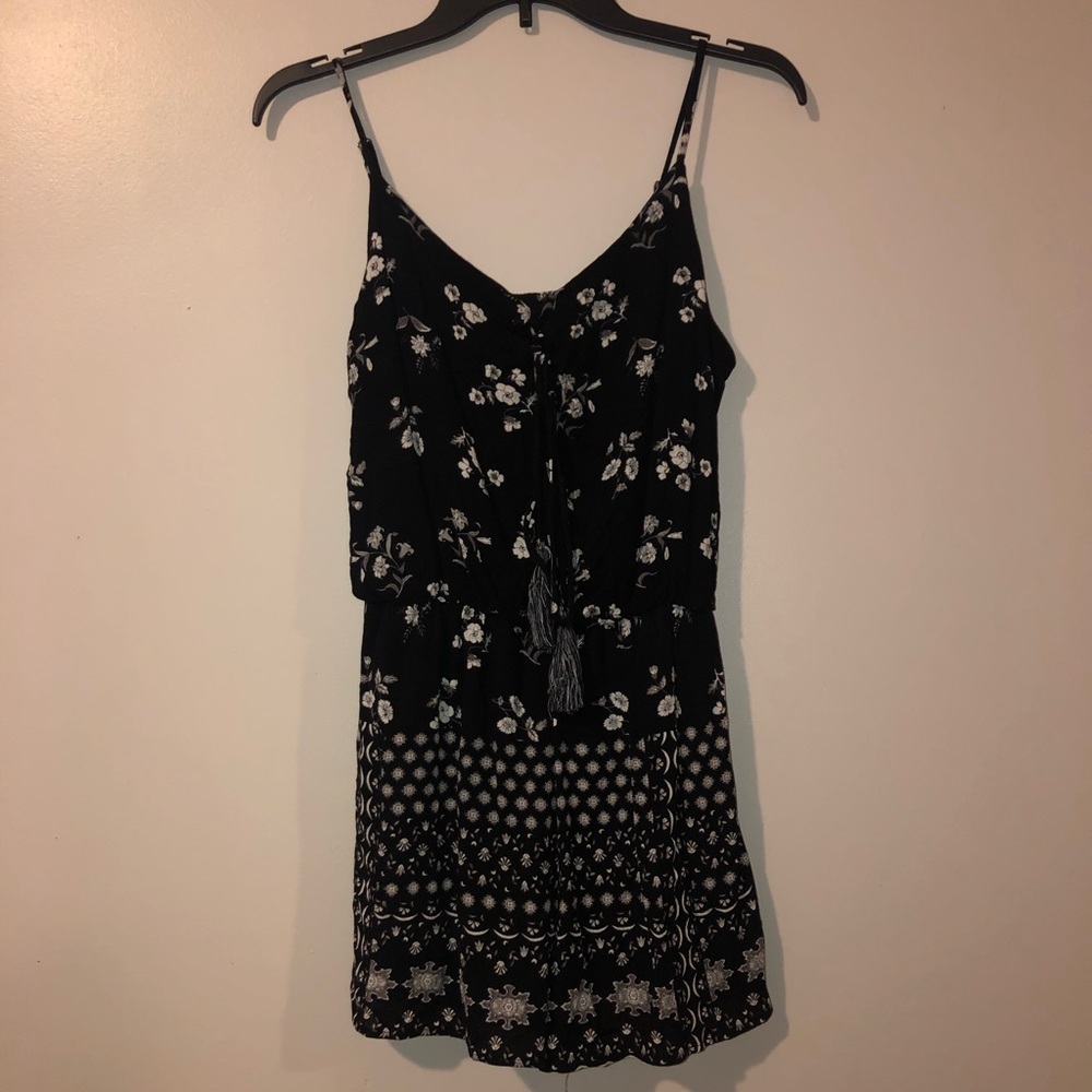 Black romper with floral detail size S